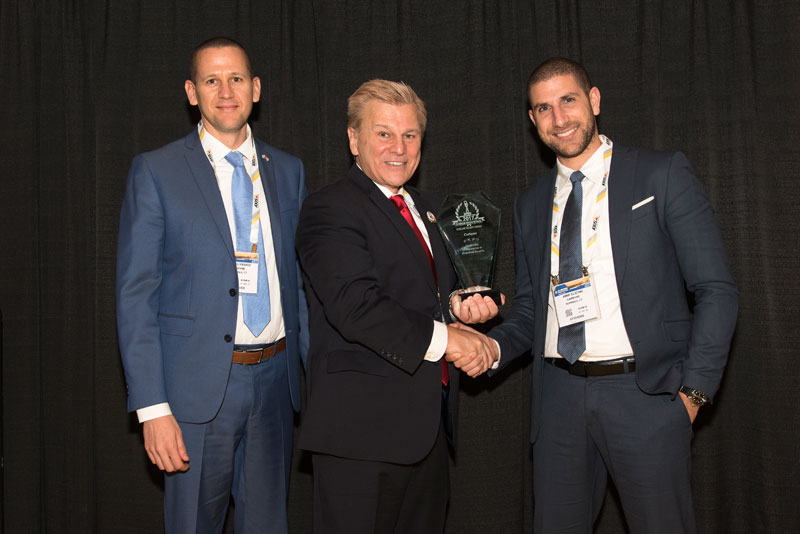 Eyal Elyashiv (at left), and Amir Elichai (at right), CEO and Founder of Carbyne and Reporty Homeland Security, receiving Carbyne’s 2017 ‘ASTORS’ Leadership & Innovation in Homeland Security Award at ISC East.