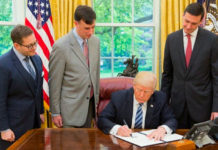President Donald J. Trump is joined by, from left to right, Josh Steinman, Rob Joyce and Tom Bossert, as he signs an Executive Order for Strengthening the Cybersecurity of Federal Networks and Critical Infrastructure (EO 13800). (Courtesy of Twitter)