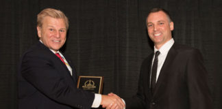 Phillip Kirsch, General Manager, Cherry Americas LLC, receives a Platinum Award for the 2017 Homeland Security Awards from Michael Madsen, publisher of American Security Today.