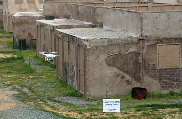 A rotary quadcopter s-UAS conducting low altitude flights through an “Urban Canyon” during TACTIC (Courtesy of DHS S&T)