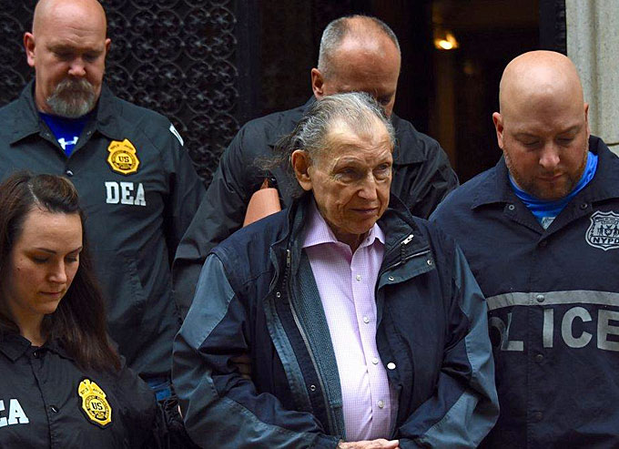 DEA agents escort Dr. Martin Tesher, 81, upon his arrest in June of 2017. He was initially accused of writing prescriptions that generated 2.2 million oxycodone pills. (Image courtesy of the Daily News)