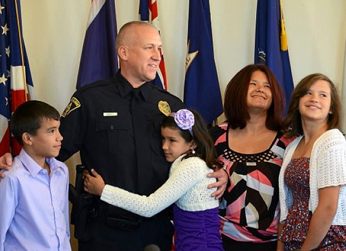 Wilkes-Barre Police Officer Chris Roberts with his family after being sworn in as Detective.