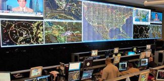 Agents at the Air and Marine Operations Center at an Air Force Reserve base in Riverside, Calif., track 20,000 to 25,000 flights a day for suspicious activity. (Image courtesy of Master Sgt. Julie Avey, AMOC)
