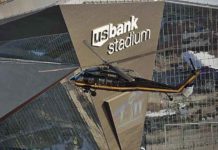A US Customs and Border Protection Air and Marine Operations UH-60 Black Hawk helicopter flies over U.S. Bank Stadium in advance of Super Bowl LII (Image courtesy of Glenn Fawcett)