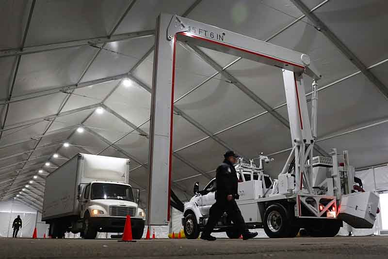 CBP OFO officers conduct non-intrusive inspections on commercial vehicles destined for US Bank Stadium to deliver provisions & equipment for Super Bowl LII in Minneapolis. (Image courtesy of Glenn Fawcett)