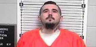 35-year-old James Kennith Decoursey is wanted in the shooting of the Hopkinsville, KY, Police officer. Decoursey is described as a white male, 6'1" tall, 260 pounds, with brown eyes and black hair. He is believed to be driving a 1997 white Chevrolet Silverado pickup truck with the license plate 2070GH. Police ask that if you see the vehicle or Decoursey, do not approach him but immediately call 911.