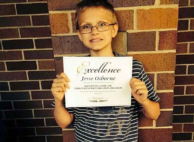 Jesse Osborne holding a certificate presented by Townville Elementary School in 2014. (Courtesy of Facebook)