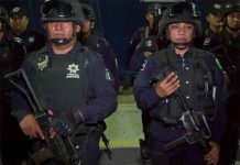 It's not part of Cancun that tourists travel to see: heavily armed police working to stop a soaring homicide rate. The fallout of Mexico's campaign targeting drug cartel leaders is spilling onto the periphery of the famous beach destination, where fractured gangs fight for control. (Image courtesy of YouTube)
