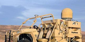 The vehicle-mounted laser combines a solid state laser with an advanced variant of the company’s Multi-Spectral Targeting System™ and installed them on a small, all-terrain Polaris militarized vehicle. (Image courtesy of Raytheon)