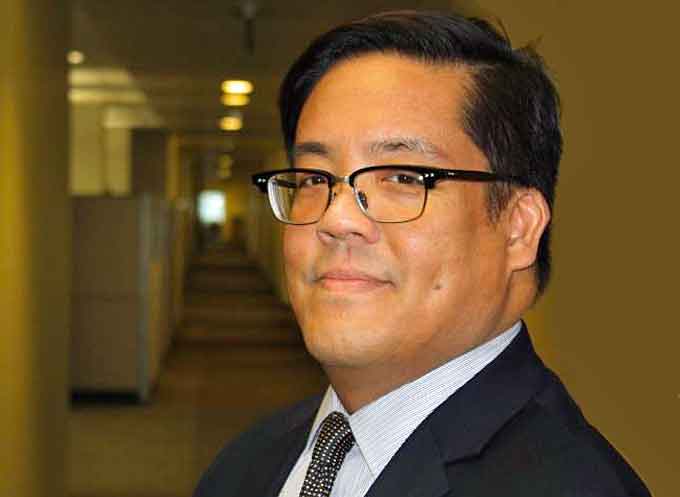 Acting U.S. Attorney Alex G. Tse
