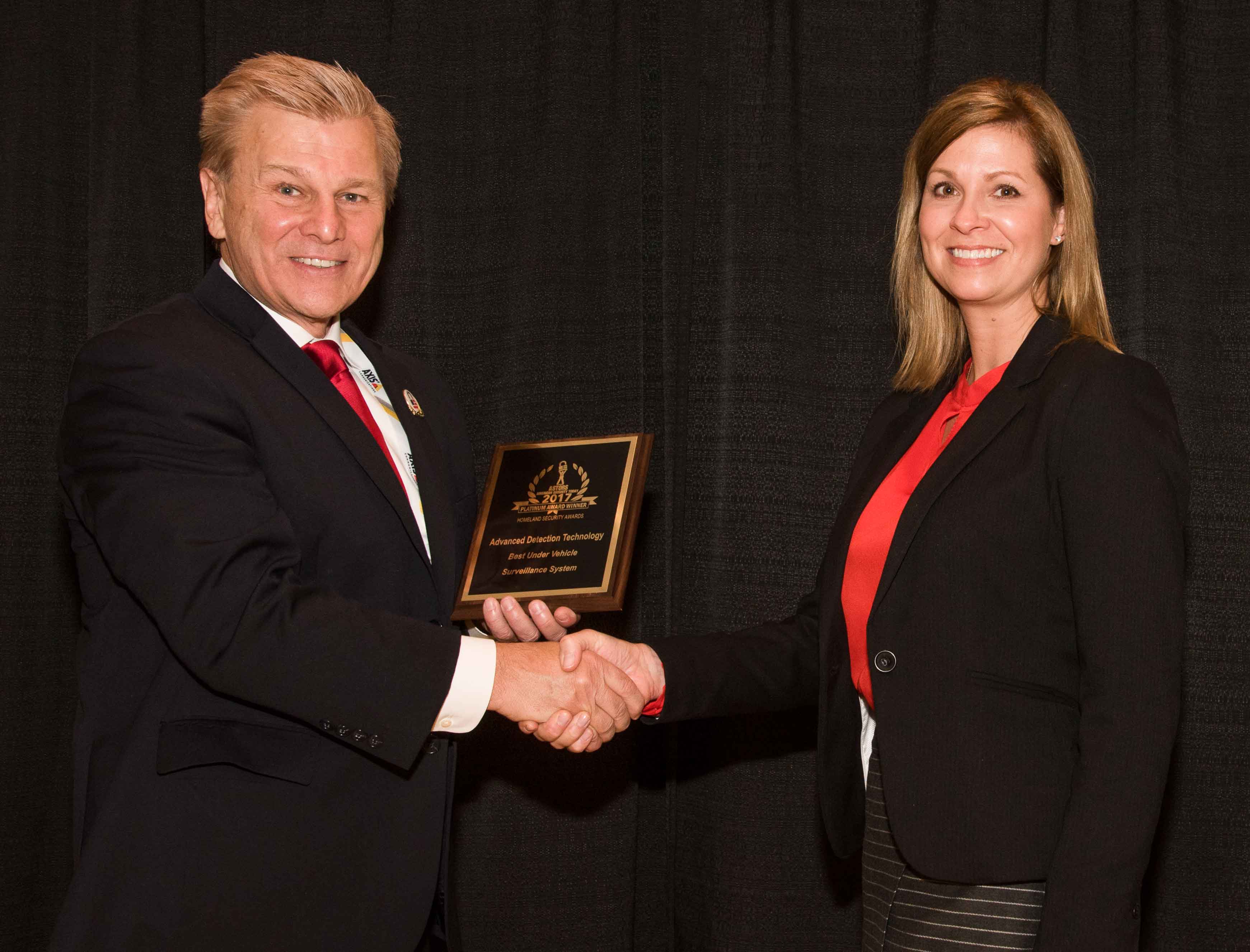 Angela Hayworth, Marketing Manager for Advanced Detection Technology, accepting the company's 2017 'ASTORS' Award at ISC East.