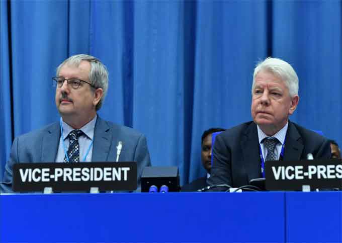 Geoff Williams (of Australia, at right) and Douglas Tonkay (USA), director of the EM Office of Waste Disposal, served as Vice-Presidents of the Review Meeting of the Contracting Parties to the Joint Convention on the Safety of Spent Fuel Management and on the Safety of Radioactive Waste Management. (Courtesy of Dean Calma IAEA)