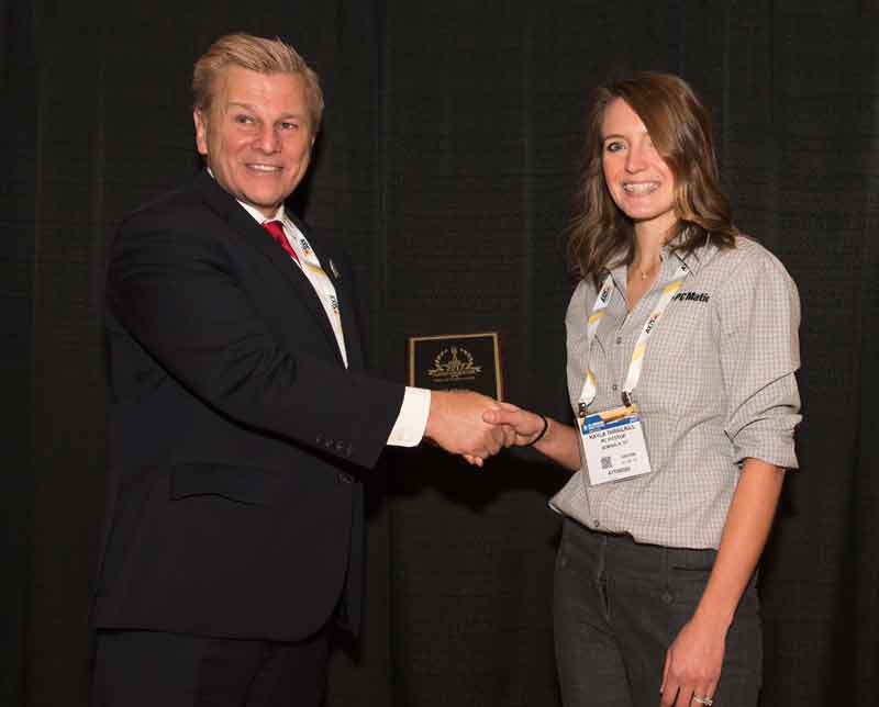 Kayla Elliott, PC Pitstop, PR & Marketing Manager accepting the 2017 'ASTORS' Award at ISC East.