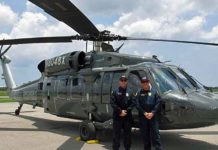 San Diego Fire-Rescue Senior Pilot Chris Hartnell (left) and Chief Chuck Macfarland accepted the department’s first S-70 Black Hawk helicopter June 27 from Sikorsky, just six months after contract award. The aircraft will be painted in San Diego Fire-Rescue livery before being put into aerial firefighting action later this year.
