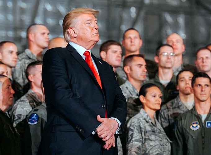 President Donald Trump prepares to address the troops at Joint Base Andrews, Md., (Courtesy of Senior Airman Delano Scott, Air Force)