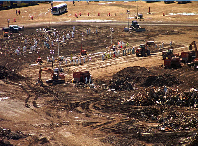 An aerial view of Fresh Kills Landfill, Staten Island, N.Y., taken on Oct. 3, 2001. Debris from Ground Zero began arriving at the Fresh Kills Landfill almost immediately after Sept. 11, 2001. Fresh Kills was used as a temporary sorting ground for the rubble from Ground Zero with three objectives: to find human remains, personal effects and any evidence of the terrorist attack such as a hijacker’s box cutters, cell phones from the planes and the black boxes. (Courtesy of U.S. Air National Guard and Tech. Sgt. Mark C. Olsen)