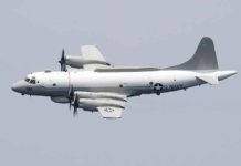 Official U.S. Navy file photo of an EP-3E Aries aircraft in flight. (Courtesy of the U.S. Navy)