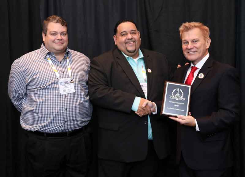 Anthony Hackett, Senstar Director or North American Sales and Joshua Gerena, NE Sales Manager accepting one of three 2018 ‘ASTORS’ Awards at ISC East.