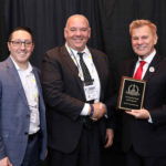 Jonathan Antar, (at left), COO and Joseph Pangaro, CEO of True Security Design accepting the company’s 2018 ‘ASTORS’ Award at ISC East