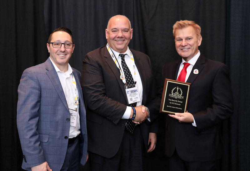 Jonathan Antar, (at left), COO and Joseph Pangaro, CEO of True Security Design accepting the company’s 2018 ‘ASTORS’ Award at ISC East