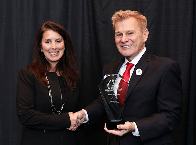 Carolyn Crandall, Chief Security Advocate and CMO at Attivo Networks, Inc., receiving a widely respected Extraordinary Leadership & Innovation Award from AST Publisher Michael Madsen, at the Annual ‘ASTORS’ Awards Presentation Luncheon at ISC East.