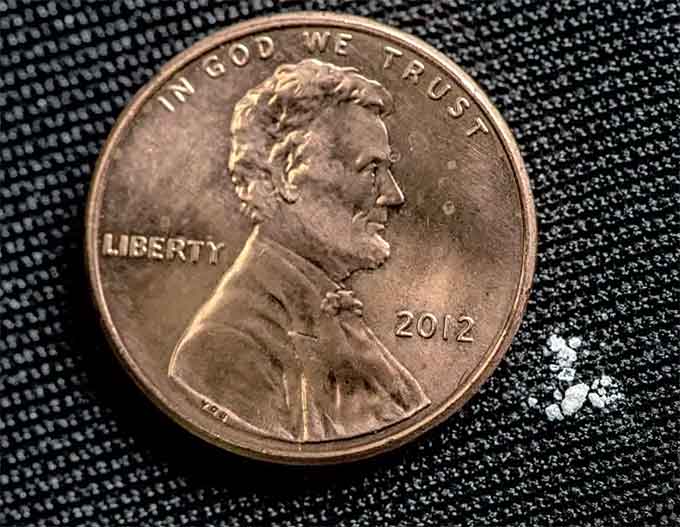 Illustration of 2 milligrams of fentanyl, a lethal dose in most people. (Courtesy of the DEA)