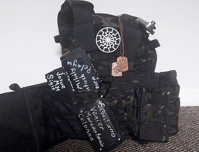 A bulletproof vest and protective gear covered in symbols and writing in a photo posted on Twitter on by the accused gunman who attacked two mosques in Christchurch, New Zealand. (Courtesy of Twitter)