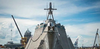 The LCS class consists of two variants, the Freedom variant and the Independence variant, designed and built by two industry teams. The Freedom variant team is led by Lockheed Martin in Marinette, Wisconsin (for the odd-numbered hulls). The Independence variant team is led by Austal USA in Mobile, Alabama, (for LCS 6 and subsequent even-numbered hulls). Pictured here, An independence-class littoral combat ship similar to the USS Oakland. (Courtesy of Austral USA)