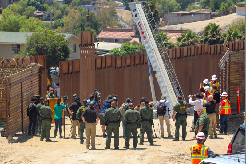 United States Border Patrol Acting San Diego Sector Chief Kathleen Scudder delivers remarks applauding the completion of 14 miles of new border wall construction in San Ysidro, California, August 9, 2019. (Courtesy of CBP by Tim Tucciarone)