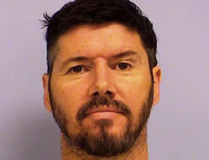 Michael Sagues, 50, has been charged with burglary after police say he broke into his neighbor’s home and installed a camera in their bathroom and took images of them undressing. (Courtesy of the Austin Police Department)