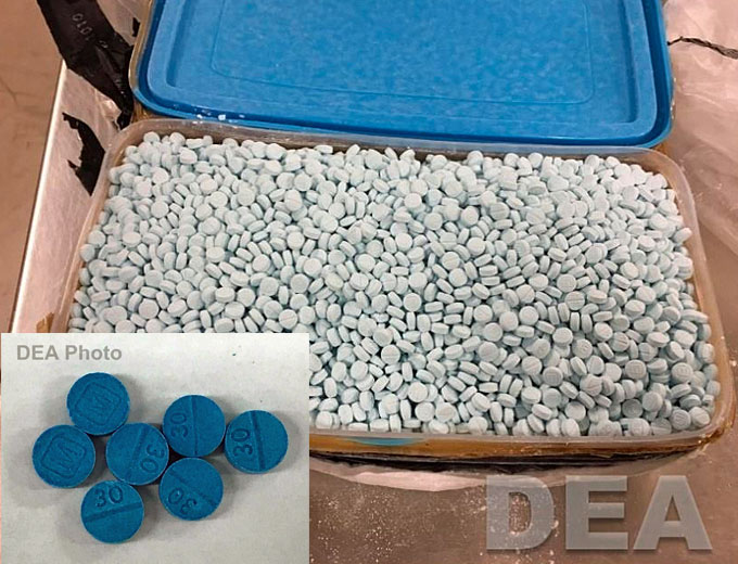 Examples of counterfeit pills seized by DEA (inset camouflaged as Oxycodone Hydrochloride 30 mg which is supplied by Mallinckrodt Pharmaceuticals. (Courtesy of DEA)