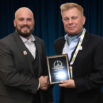 Keith Schoffstall, Electric Guard Dogs National Trade Show Coordinator & Regional Account Manager accepts 2019 'ASTORS' Award at ISC East.