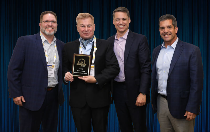 LenelS2 representatives accepting their 2019 ‘ASTORS’ Award at the 2019 ‘ASTORS’ Awards Luncheon at ISC East. From right, John Pierangeli, Vice President, North American Sales, S2 Security Corporation and Matt Moreno, Regional Manager, of United Technologies.