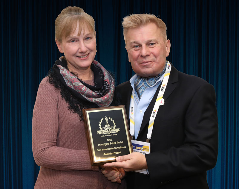 Linda Haelsen, Published Author and Marketing Communications Manager for NICE, accepts one of the company's 2019 'ASTORS' Awards at ISC East.