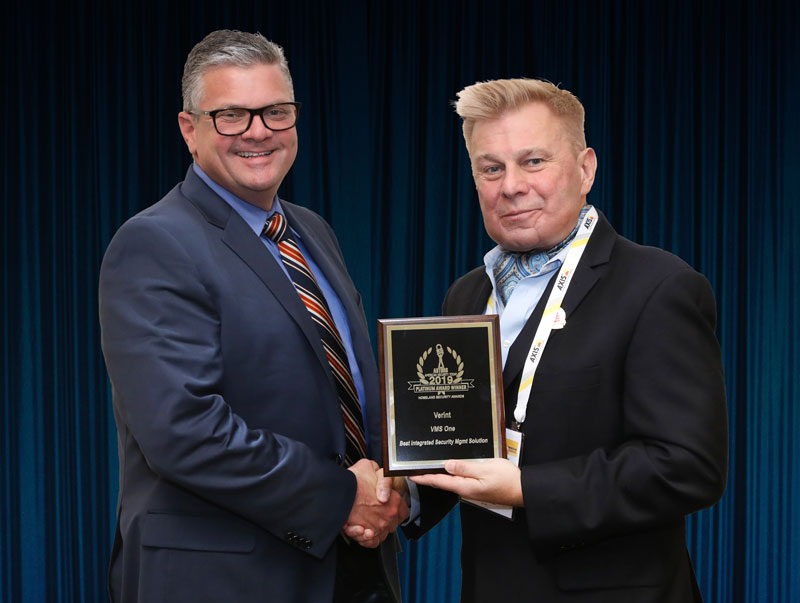 Bill Eckard, Director of Strategic Accounts and Federal Government at Verint, accepting one of two Platinum awards on behalf of the company at the 2019 ‘ASTORS’ Awards Presentation Luncheon.