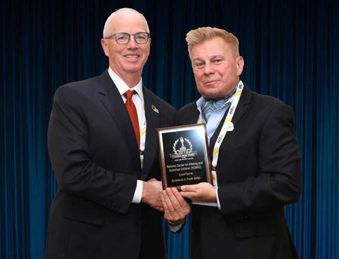 John Clark, CEO of NCMEC, accepting a 2019 'ASTORS' Award at the 'ASTORS' Awards Luncheon held during ISC East.