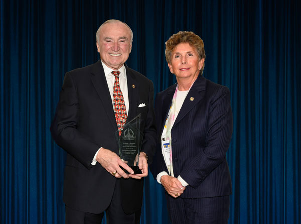 Dr. Kathleen Kiernan (at right), is pictured here with Commissioner Bill Bratton, presenting the Commissioner the ‘2019 ‘ASTORS’ Person of the Year’ for his Lifetime of Dedication and Extraordinary Leadership in Homeland Security and Public Safety, at the 2019 ‘ASTORS’ Security Awards Program at ISC East.