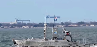The Common Unmanned Surface Vehicle (CUSV), built by the defense conglomerate Textron Systems, is a 40-foot remotely-operated launch with long endurance and range. (Courtesy of the U..S. Navy and YouTube)