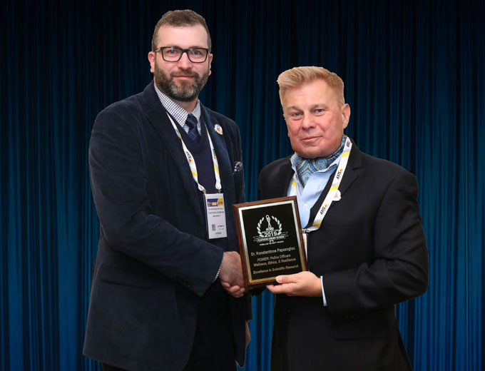 Dr. Konstantinos Papazoglou accepting his 2019 'ASTORS' Award at the 'ASTORS' Awards Luncheon held during ISC East.
