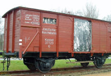 Pictured here, a reconstructed railway wagon at the Neuengamme memorial in which prisoners were transported. (Courtesy of Wikipedia.)