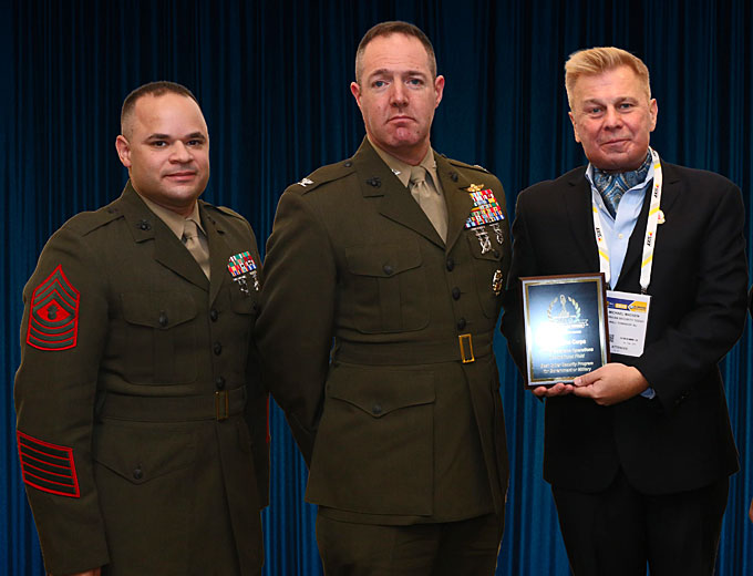 Colonel Seth Milstein and Master Gunnery Sergeant Carlos Torres accepting the 1700 Cyberspace OccFld Platinum ‘ASTORS’ Award at the 2019 ‘ASTORS’ Awards Luncheon at ISC East.