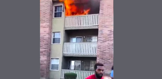 Blanks, who served in the military, and works for Allied Universal caught and saved this 3yo child from a burning building. (Courtesy of YouTube)