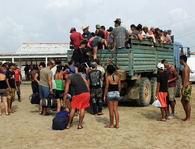 The journey that unaccompanied children undertake from their home countries is extremely dangerous, and the danger is more severe during the COVID-19 pandemic. Central American Refugees boarding a Truck on their way north to the US border.