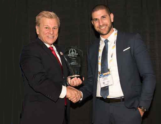 Amir Elichai, CEO (right), receiving the company's ‘ASTORS’ Leadership & Innovation in Homeland Security Award at ISC East