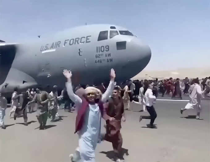 At least seven people were killed at Kabul International Airport as Afghan and foreign citizens attempted to leave the country Sunday, US officials say. (Courtesy of YouTube)