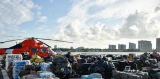 Approximately 61,130 pounds of seized contraband is staged to be offloaded on board the U.S. Coast Guard Cutter James at Port Everglades, Florida, Aug. 5, 2021. The James is homeported in Charleston, South Carolina. (Courtesy of the U.S. Coast Guard by Petty Officer 3rd Class Ryan Estrada)