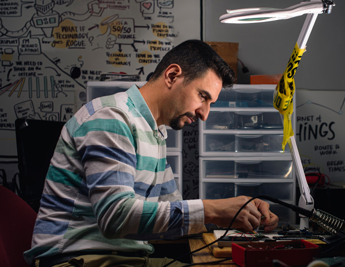 Umit Karabiyik, an assistant professor in computer and information technology, works in Purdue’s Cybersecurity and Forensics Lab. Karabiyik researches forensic intelligence and how investigators can use terabytes of evidence from a myriad of devices. (Courtesy of Purdue University by Rebecca McElhoe)