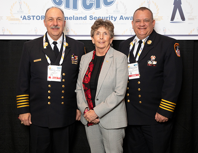 Thomas Richardson, FDNY Department Chief;  Dr. Kathleen Kiernan, President of NEC National Security Systems;  and Richard Blatus, FDNY Deputy Chief of Operations at the 2021 'ASTORS' Awards Luncheon at ISC East.