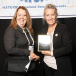 guardDog AI's Director of Business Development Kelly Ryan accepts one of three 2021 'ASTORS' Awards at the 2021 'ASTORS' Awards Luncheon at ISC East