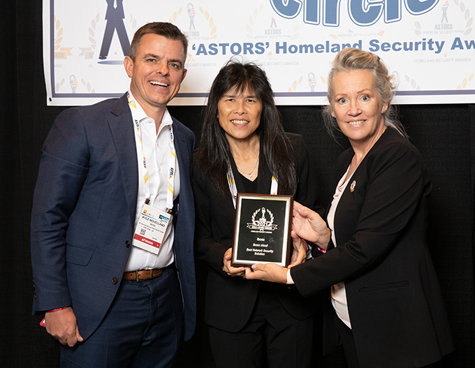 Kyle Novellano, Sr. Sales Director and SVP May Mitchell receive 2021 ’ASTORS’ Award for iBoss Cloud at ISC East.